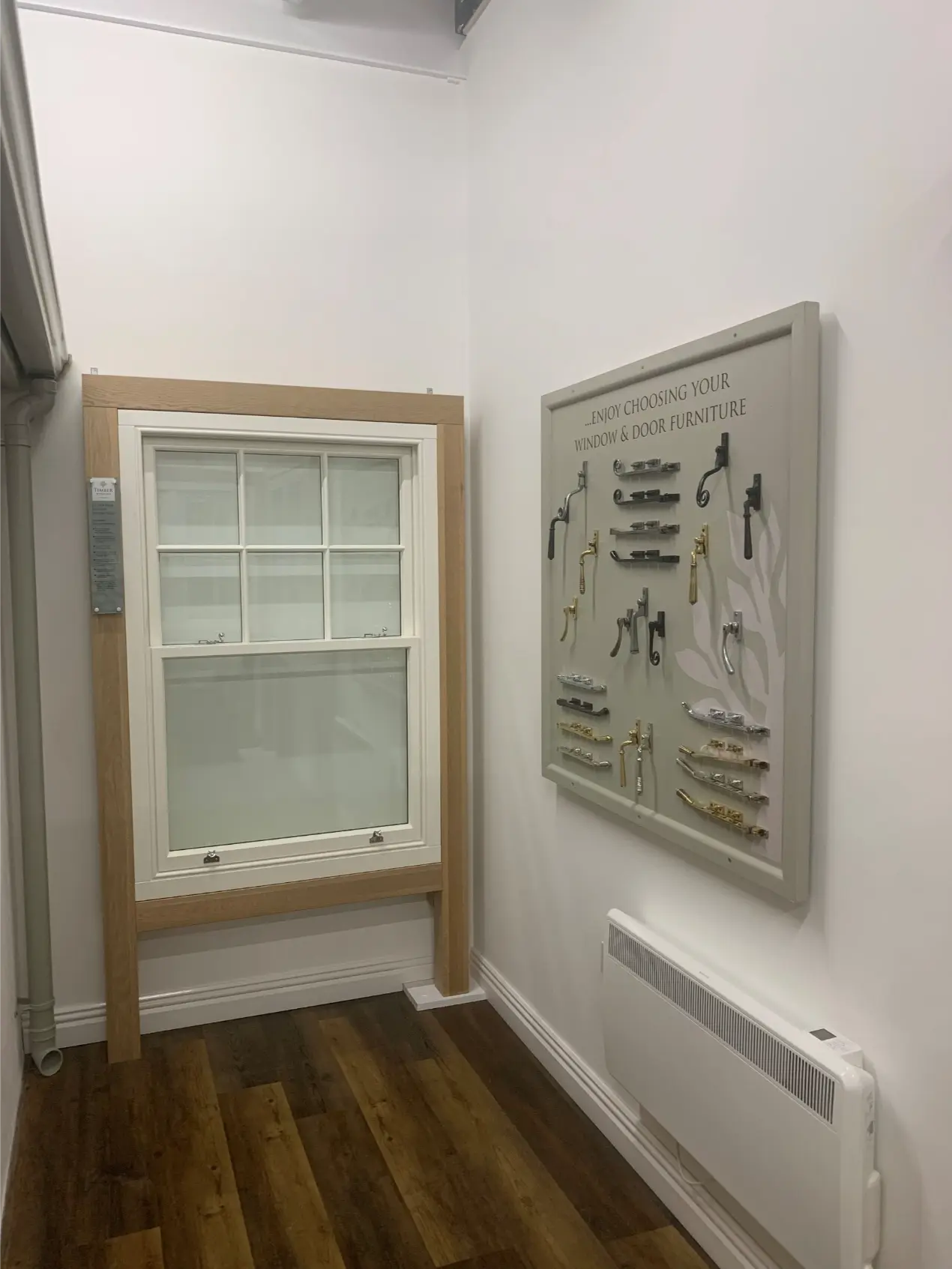 a door with a window and a sign on the wall